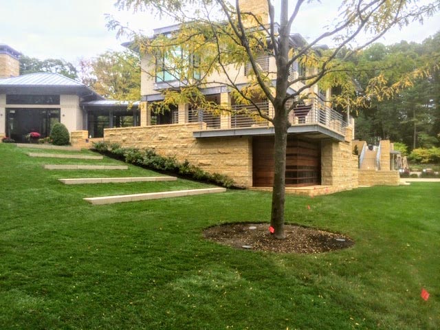 Stairs on a grass hillside.