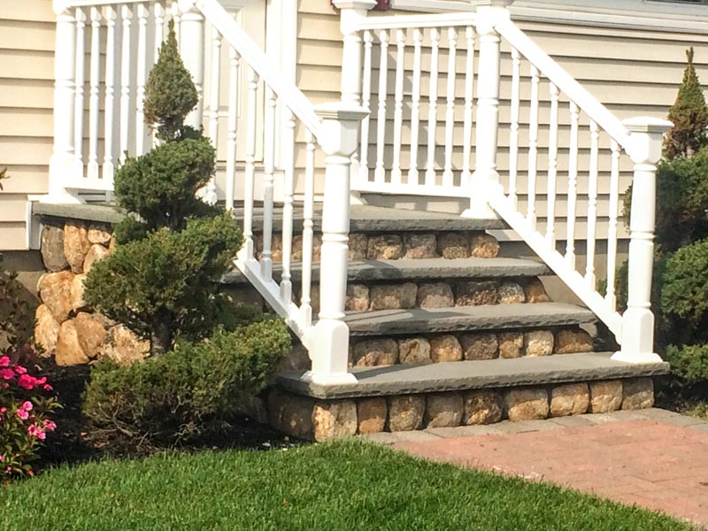 Stone stairs leading to a house.