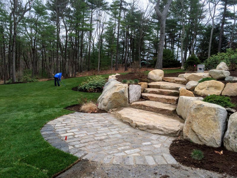 Stone wall and landscaping.